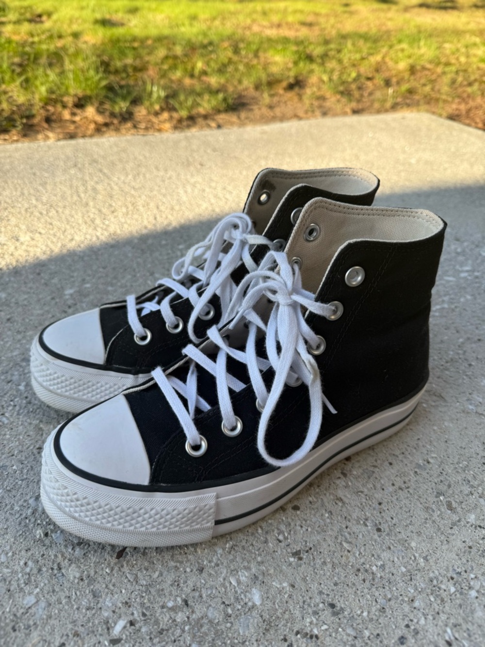 Converse Women’s Black and White High-Top Sneakers